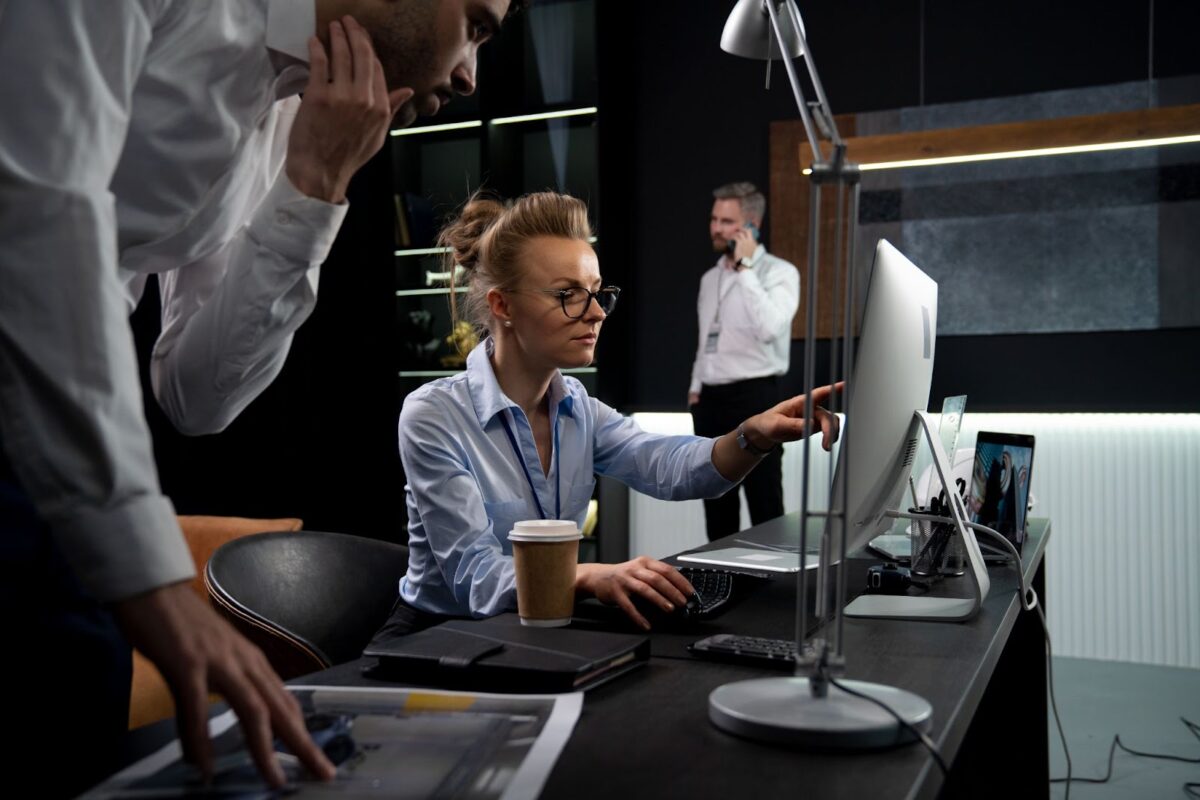 girl shows something on the computer screen